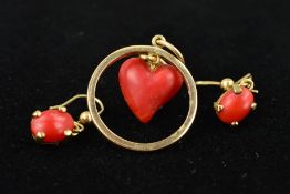 A DYED CORAL PENDANT AND A PAIR OF EARRINGS, the pendant designed as a coral heart suspended