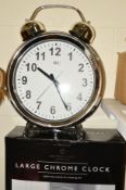 A BOXED CONTEMPORARY CHROME 'LARGE CLOCK' shaped as an alarm clock, height 57cm