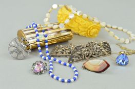 NINE ITEMS OF JEWELLERY to include a mother of pearl necklace, a scrolling buckle, a plastic bangle,