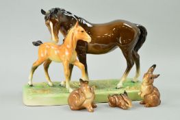 A BESWICK MARE AND FOAL ON BASE, No 953, first version (foal reglued to base) and three Beswick