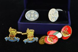 THREE PAIRS OF CUFFLINKS to include a pair of Charles Tywhitt silver cufflinks, the panels of oval