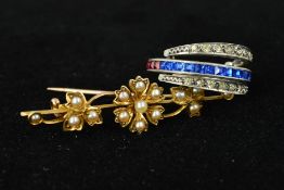AN EARLY 20TH CENTURY 15CT GOLD BROOCH AND A HINGED PASTE RING, the brooch designed as a flower