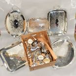 A LARGE SILVER PLATED TWIN HANDLED RECTANGULAR TRAY, four other twin handled trays and a box of