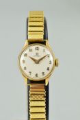 A MID 20TH CENTURY 9CT GOLD LADY'S OMEGA WRISTWATCH, round case measuring approximately 19.4mm in
