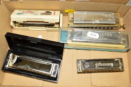 A COLLECTION OF HARMONICAS to include Hohners 'The Chromonica' and cased Hohner 'Big River Harp' (