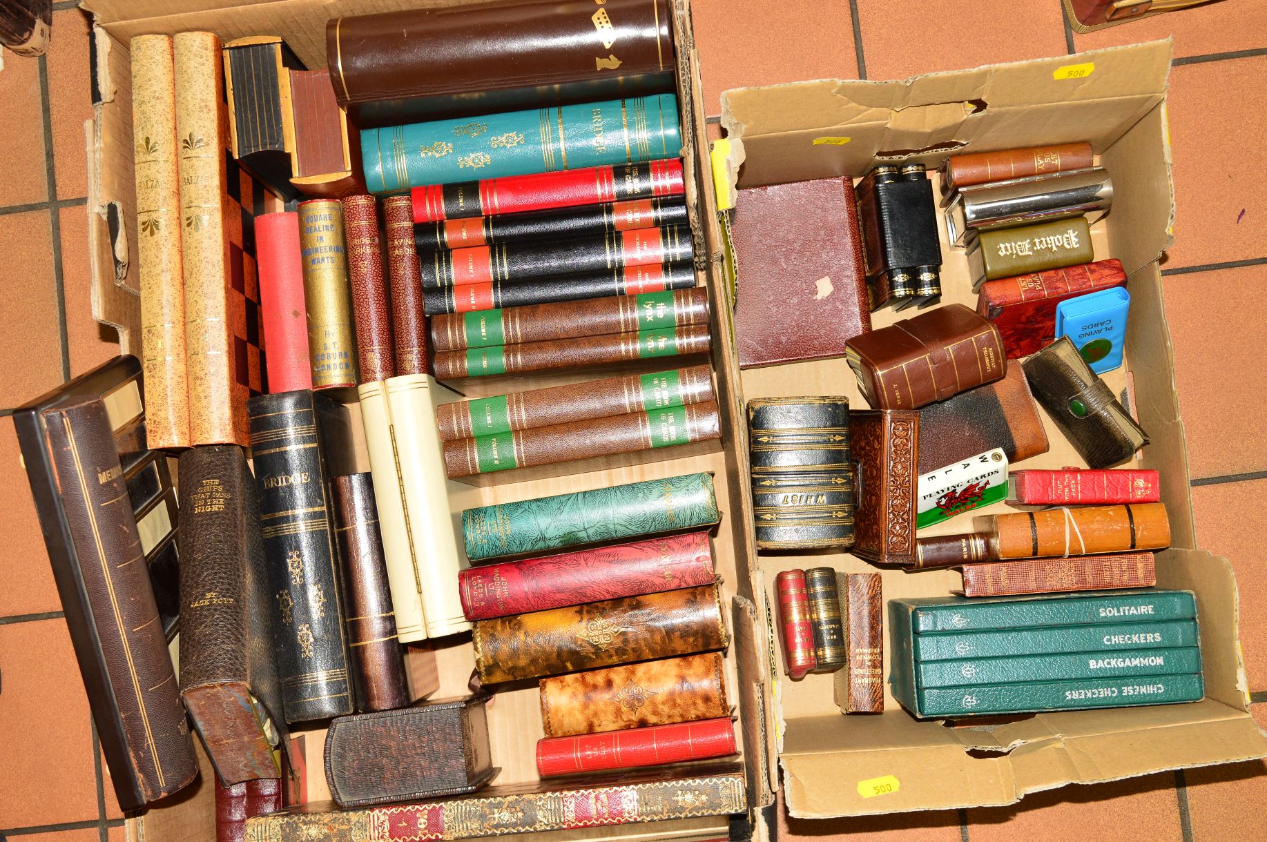 TWO BOXES OF NOVELTY GAME COMPENDIUMS/PLAYING CARDS etc, all shaped as books