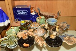 A COLLECTION OF WADE ORNAMENTS, etc, to include Tetley money bank, Viking ship, tortoises, fish