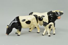 A FAMILY OF THREE COOPERCRAFT FRIESIAN COWS