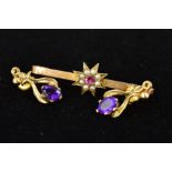 AN EARLY 20TH CENTURY 9CT GOLD GEM SET BROOCH AND A PAIR OF 9CT GOLD AMETHYST EARRINGS, the brooch