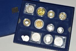 TWELVE ASSORTED 20TH CENTURY SILVER COINS, including £5 and £2, Cayman Islands 2006 five dollars,