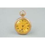 AN EARLY 20TH CENTURY 9CT GOLD POCKET WATCH with Roman numeral hour markers, engraved floral