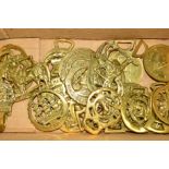 APPROXIMATELY TWENTY SIX 20TH CENTURY HORSE BRASSES including replicas and a brass coat hook