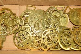 APPROXIMATELY TWENTY SIX 20TH CENTURY HORSE BRASSES including replicas and a brass coat hook