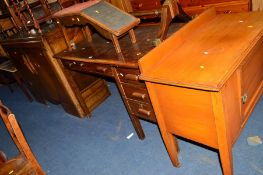 AN OAK DESK WITH FOUR DRAWERS, a satinwood washstand, an oak two door sideboard and an Edwardian