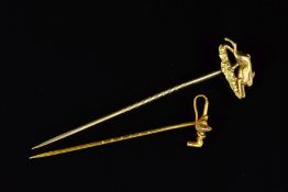 TWO STICKPINS, the first a gold plated stick pin depicting a running hare, the second a fox's head