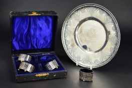 AN AMERICAN STERLING SILVER CIRCULAR PLATTER, the raised decoration of shells and scrolls,