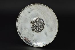 OMAR RAMSDEN, AN ARTS & CRAFTS CIRCULAR SILVER DISH, Tudor Rose boss to centre with hand hammered