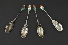 A SET OF FOUR WILLIAM HAIR HASELER SILVER AND ENAMEL TEASPOONS, the handle finials enamelled in