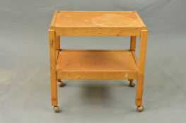 DEREK 'LIZARDMAN' SLATER, an oak two tier tea trolley that seperates at each level by moulded