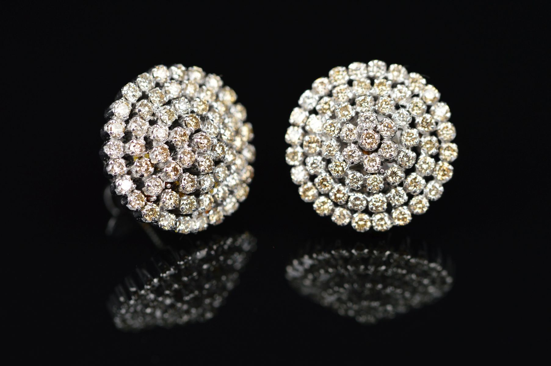 A MODERN PAIR OF 14CT WHITE GOLD DIAMOND ROUND CLUSTER EAR STUDS, large disc design, measuring