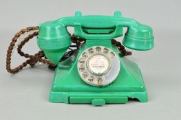 A GREEN BAKELITE TELEPHONE MODEL NO.232 SERIES, braided cord, alphabet dial, drawer, converted to