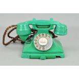 A GREEN BAKELITE TELEPHONE MODEL NO.232 SERIES, braided cord, alphabet dial, drawer, converted to