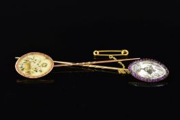 TWO 9CT EARLY VICTORIAN STICKPINS, both terminals of oval outline, the first with central panel