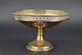 A GEORGE V SILVER PEDESTAL DISH, lattice pierced rim, circular stepped foot, makers Barker Bros,