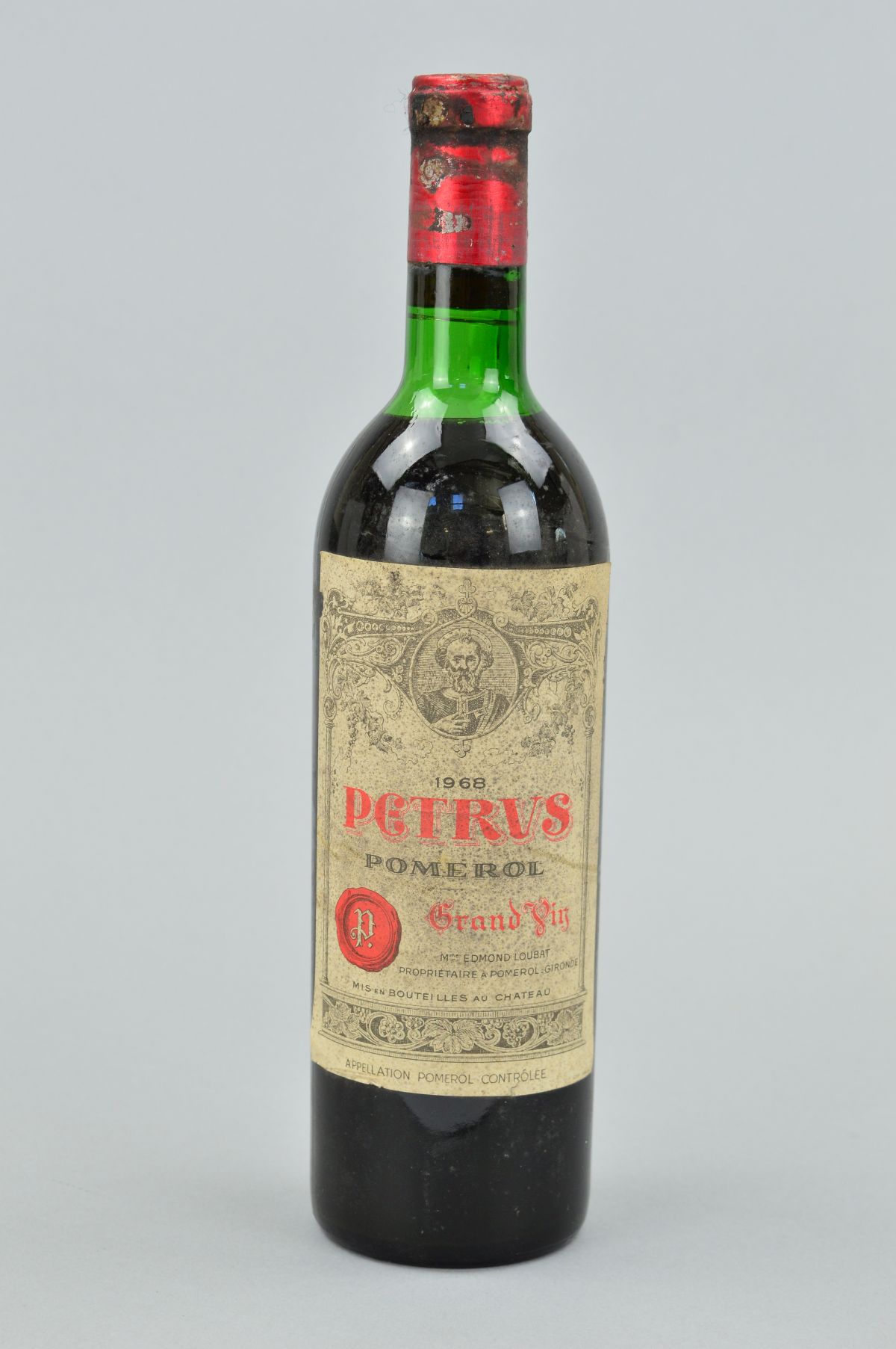 A BOTTLE OF PETRUS POMEROL 1968, fill level upper shoulder, seal intact but some staining, label