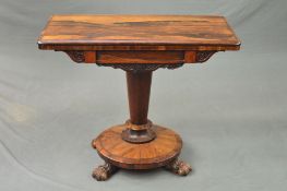 AN EARLY VICTORIAN ROSEWOOD CARD TABLE, the rectangular fold over rotating top with circular green