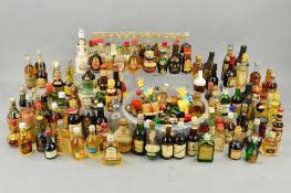 A LARGE COLLECTION OF MINIATURES including Whisky, Brandy, Benedictine, Tequila, Rum and many