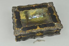 A VICTORIAN PAPIER MACHE WORK BOX, of wavy rectangular outline, the hinged cover painted and