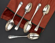 FIVE GEORGIAN HANOVERIAN PATTERN SILVER TABLESPOONS, a pair with shell backs and three with scroll