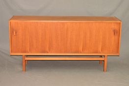 NILS JONSSON FOR TROEDS, MODEL TURIN, SWEDEN, a Teak 1960's sideboard with double sliding doors,