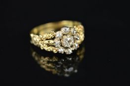A GOLD 19TH CENTURY DIAMOND CLUSTER RING, old mine cut diamonds claw set in closed back settings, to