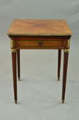 AN EARLY 20TH CENTURY FRENCH WALNUT AND BRASS ENVELOPE CARD TABLE, the swivel top opening to