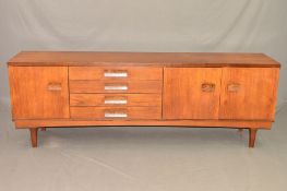 BCM/BATH CABINET MAKERS, a Teak 7ft sideboard, with four drawers and three cupboard doors with