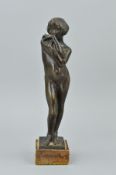 ERICA LEE, a bronzed sculpture of a nude woman, inscribed 'Erica Lee 1919', attached to a marble