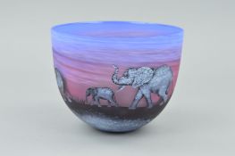 MALCOLM SUTCLIFEE, a cameo glass bowl depicting elephants against a frosted fading to blue ground,