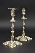 A PAIR OF GEORGE III CAST SILVER CANDLESTICKS BY WILLIAM CAFE, LONDON 1763, shaped square