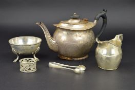 A GEORGE III SILVER HELMET SHAPED CREAM JUG, bright cut decoration and engraved initials to oval