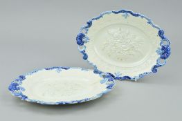 A PAIR OF EARLY 19TH CENTURY PEARLWARE OVAL TWIN HANDLED PLATTERS, moulded shell and scroll blue