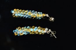 A MODERN PAIR OF CITRINE AND BLUE BRIOLETTE CUT DROP EARRINGS, measuring approximately 42.0mm in