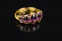 A GOLD LATE VICTORIAN AMETHYST HALF HOOP RING, five oval mixed cut amethysts graduating in size,