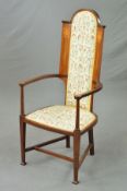 AN EARLY 20TH CENTURY ART NOUVEAU STYLE MAHOGANY AND INLAID ARMCHAIR, domed top rail above an arched