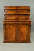 A VICTORIAN ROSEWOOD CHIFFONIER, the rectangular back with moulded top edge terminating in foliate