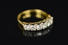 A LATE 20TH CENTURY DIAMOND HALF HOOP RING, six modern round brilliant cut diamonds totalling