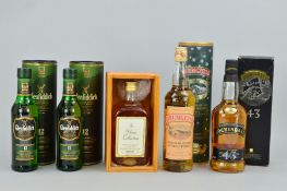 FOUR BOTTLES OF SINGLE MALT, to include a bottle of Lochindaal 43 Islay Single Malt Scotch Whisky,