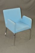 SKANDIFORM SWEDISH ARMCHAIR, covered in light blue upholstery, on a chrome frame (condition: very