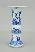 A CHINESE PORCELAIN BLUE AND WHITE GU VASE, decorated with bands of figures and animals, four blue